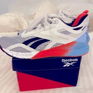 Woman’s Reebok NANO X 6.5. White, orange & blue